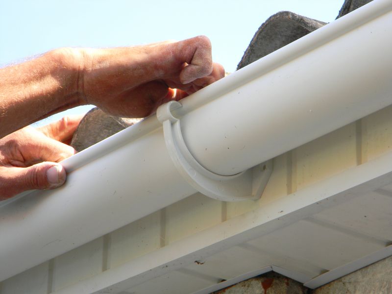 Gutter Installation on Residential Roof
